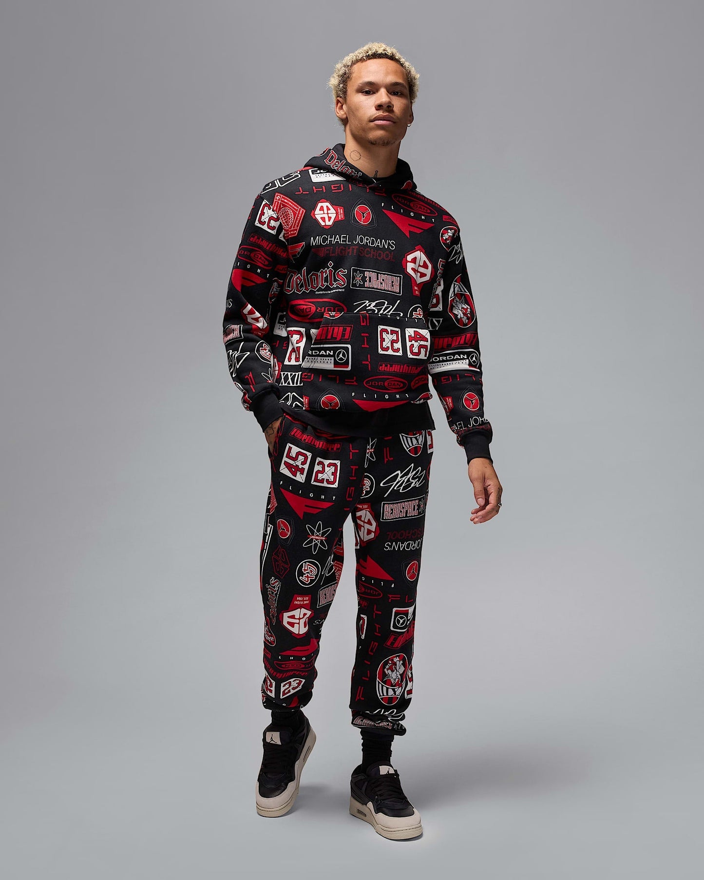 Nike Men's Jordan Essentials Printed Fleece Pants Apparel - Black / Varsity Red